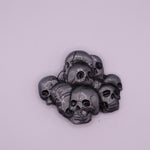 Pile of Skulls Belt Buckle