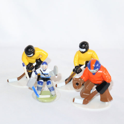 DecoPac Lot of 4 Hockey Players 